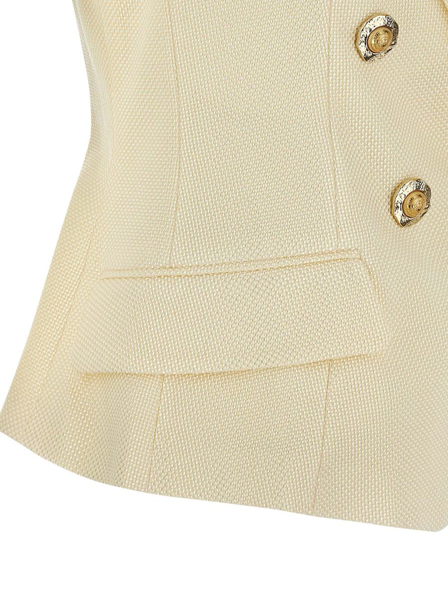 Balmain väst med guldmynt