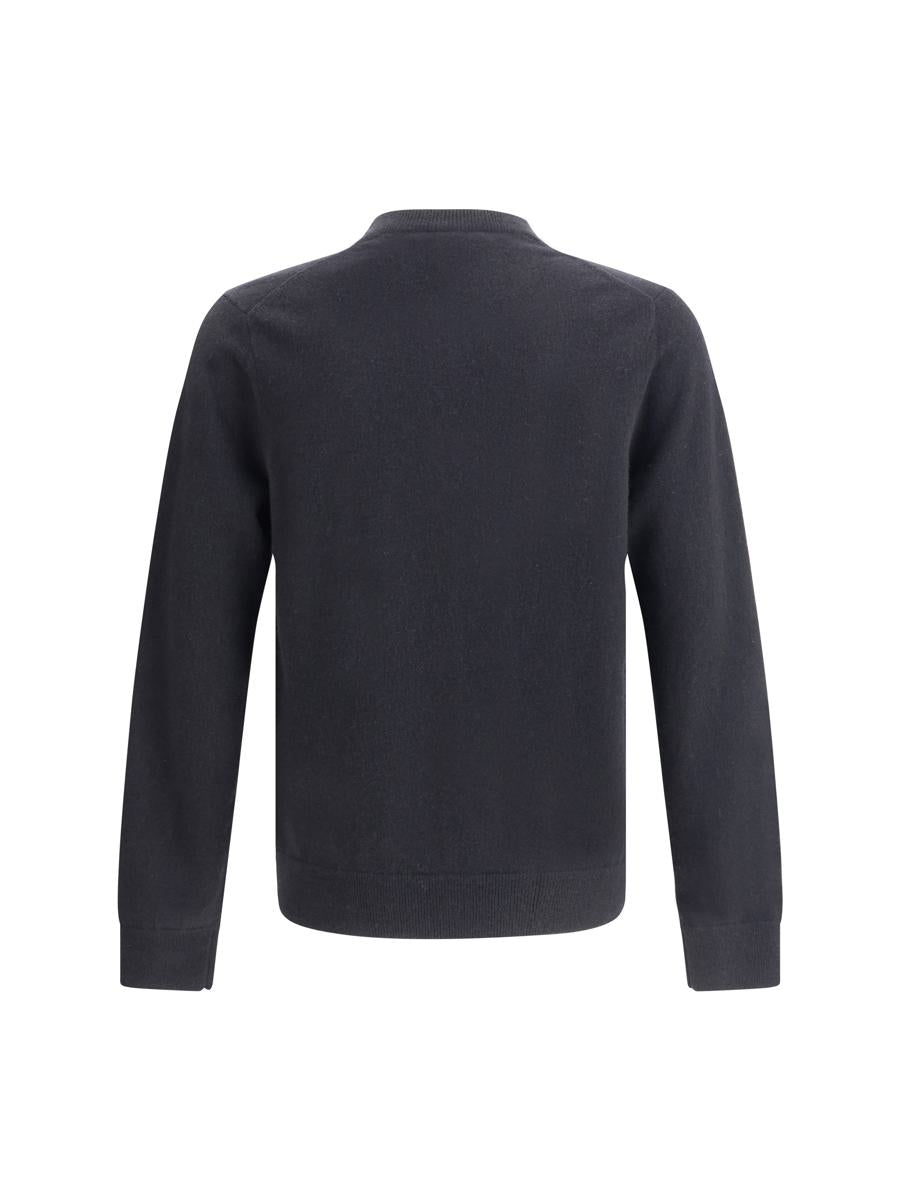 Comme Des Garçons Stickade kläder