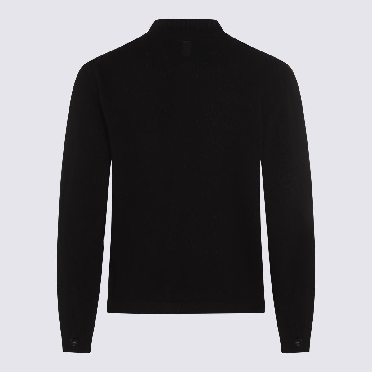 Canali svarta stickade ullplagg
