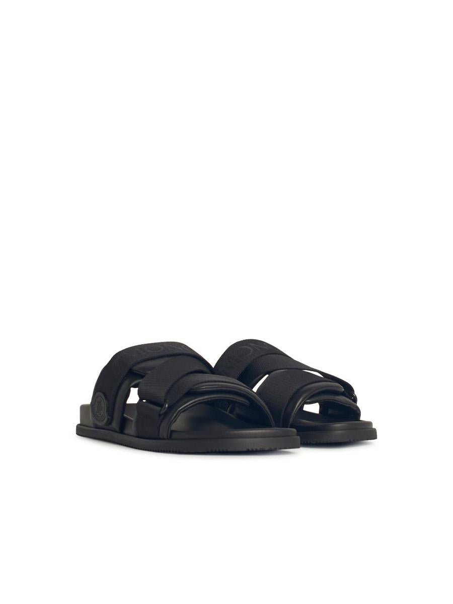 Moncler svarta sandaler i läderblandning