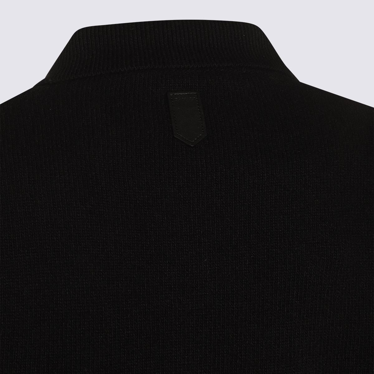 Canali svarta stickade ullplagg