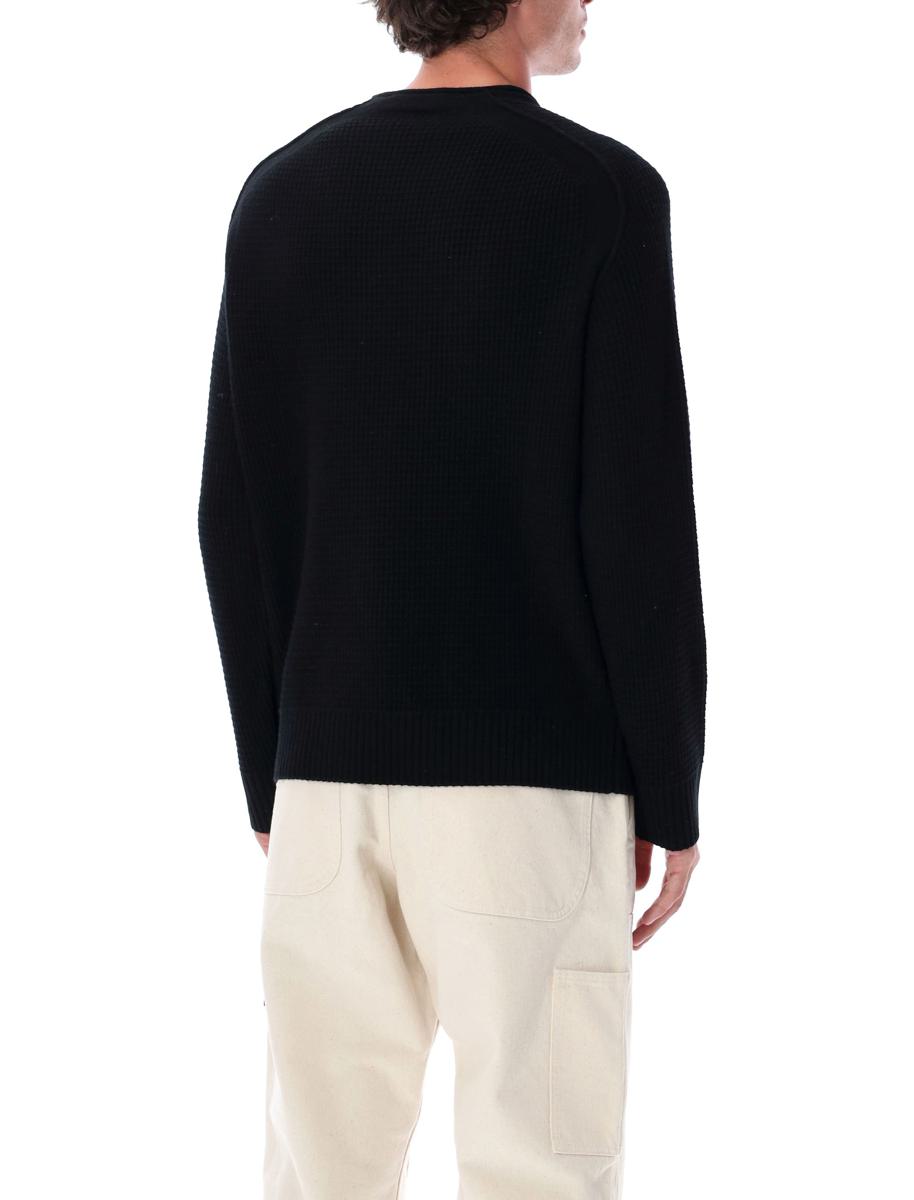 Stone Island svart ulltröja med fiskarribbor