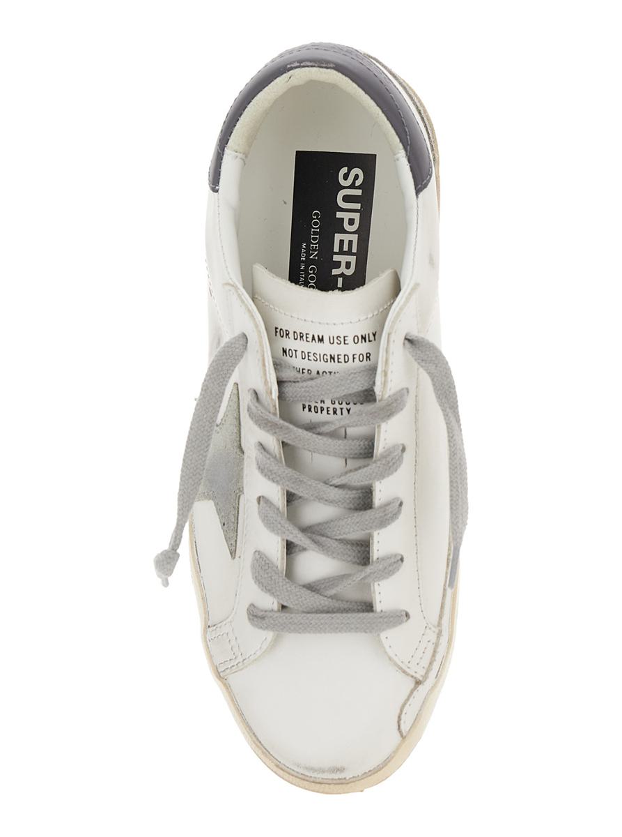 Vita låga sneakers med stjärnmärke i vintageläder för kvinnor