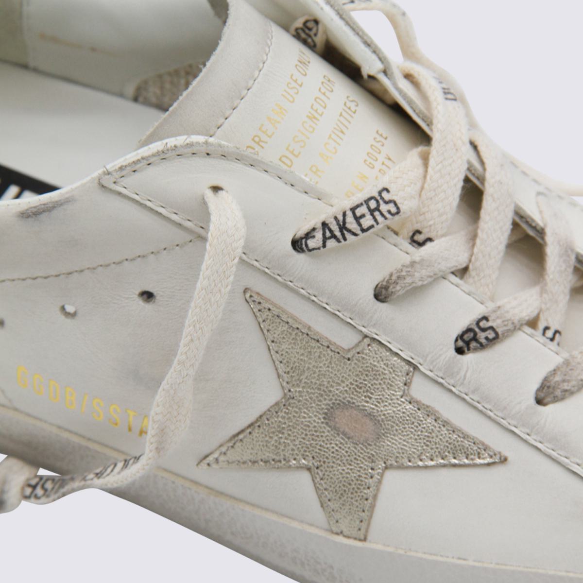 Golden Goose Vita och Svarta Lädersneakers