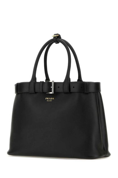 Prada handväskor.