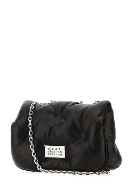 Maison Margiela handväskor.
