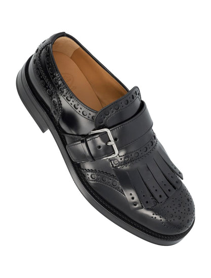Church'S svarta läderbrogues med munkrem
