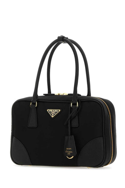 Prada handväskor.