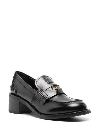 Miu Miu Penny Loafers i borstat läder