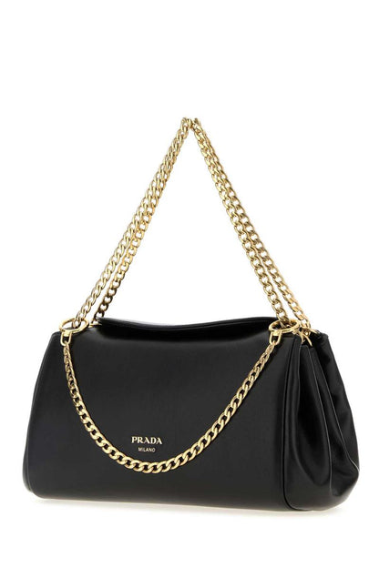 Prada handväskor.