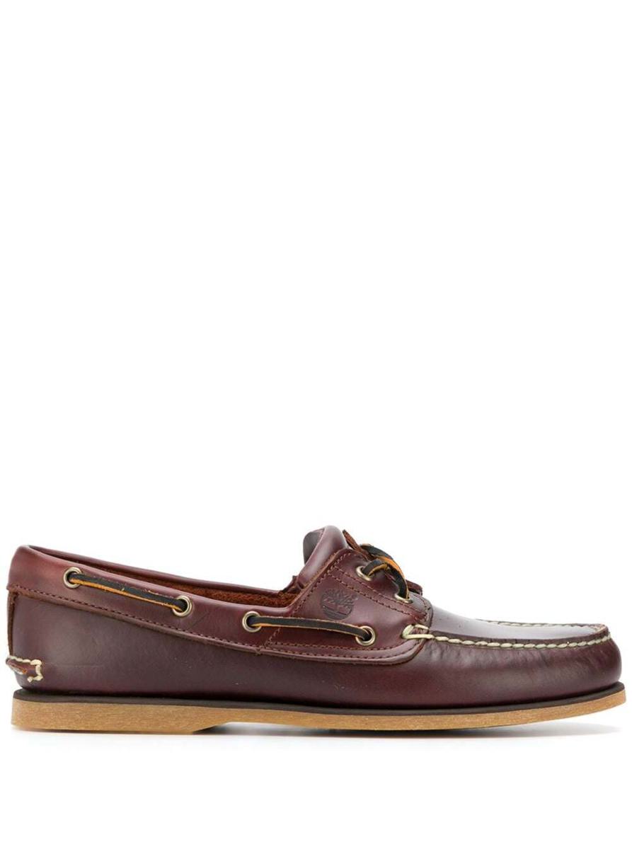 Klassiska båtloafers i brunt läder för män