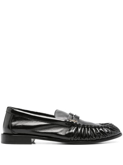 Saint Laurent Le Loafer Smidiga I Glänsande Läderskor