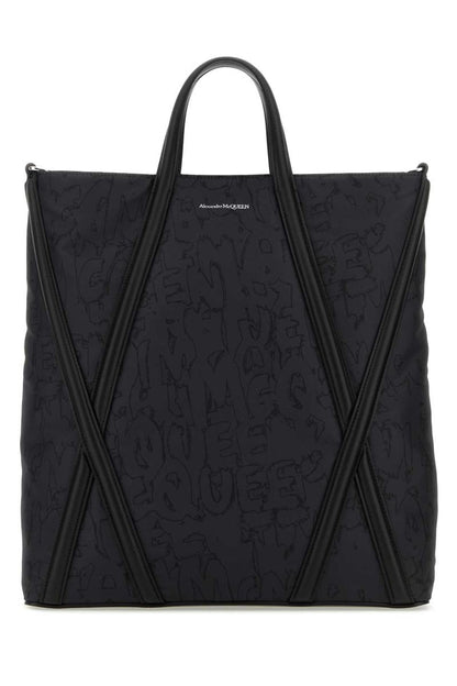 Alexander McQueen handväskor.