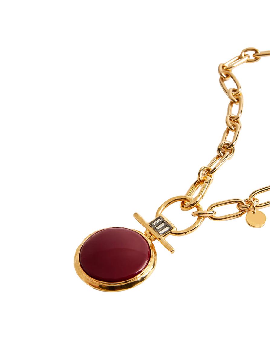 'Energy' rött halsband med kedjelänksdesign och runt hänge i mässingskvinna