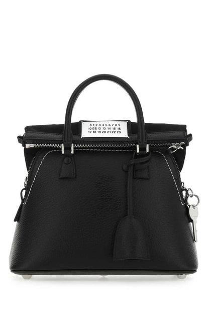 Maison Margiela handväskor.