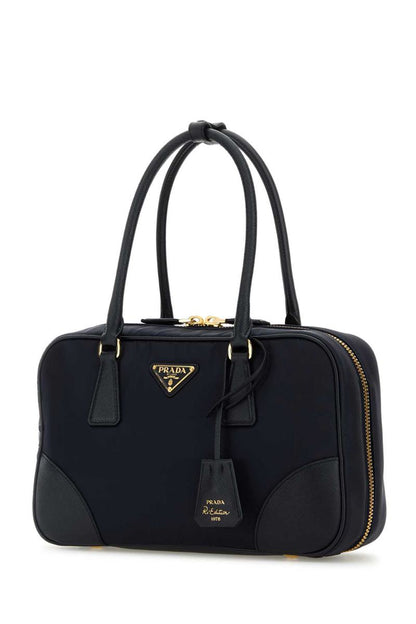 Prada handväskor.