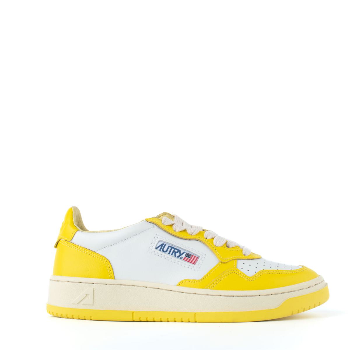Autry tvåfärgade vita och gula lädersneakers