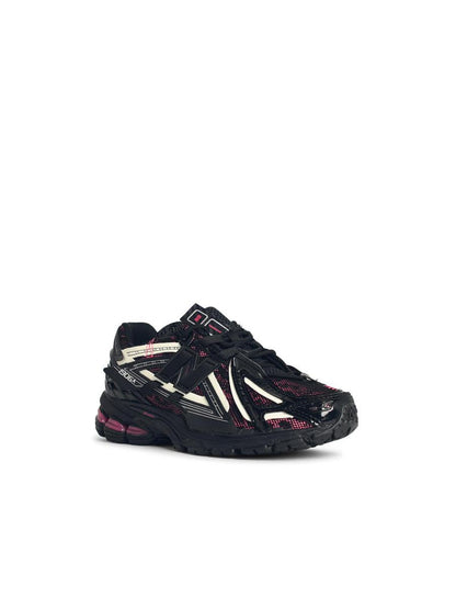 New Balance '1906' svarta sneakers i tygblandning