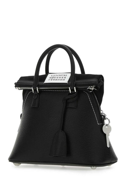 Maison Margiela handväskor.