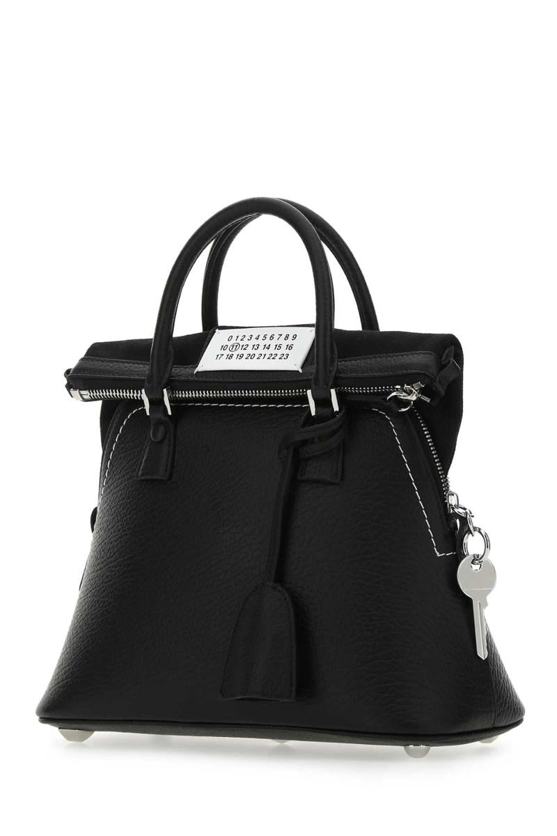 Maison Margiela handväskor.