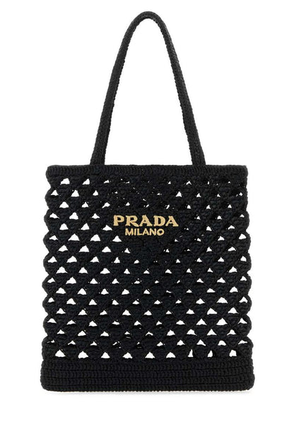 Prada handväskor.