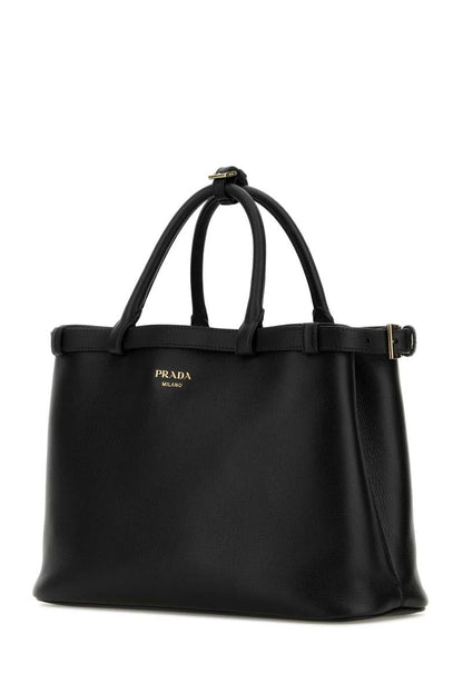 Prada handväskor.