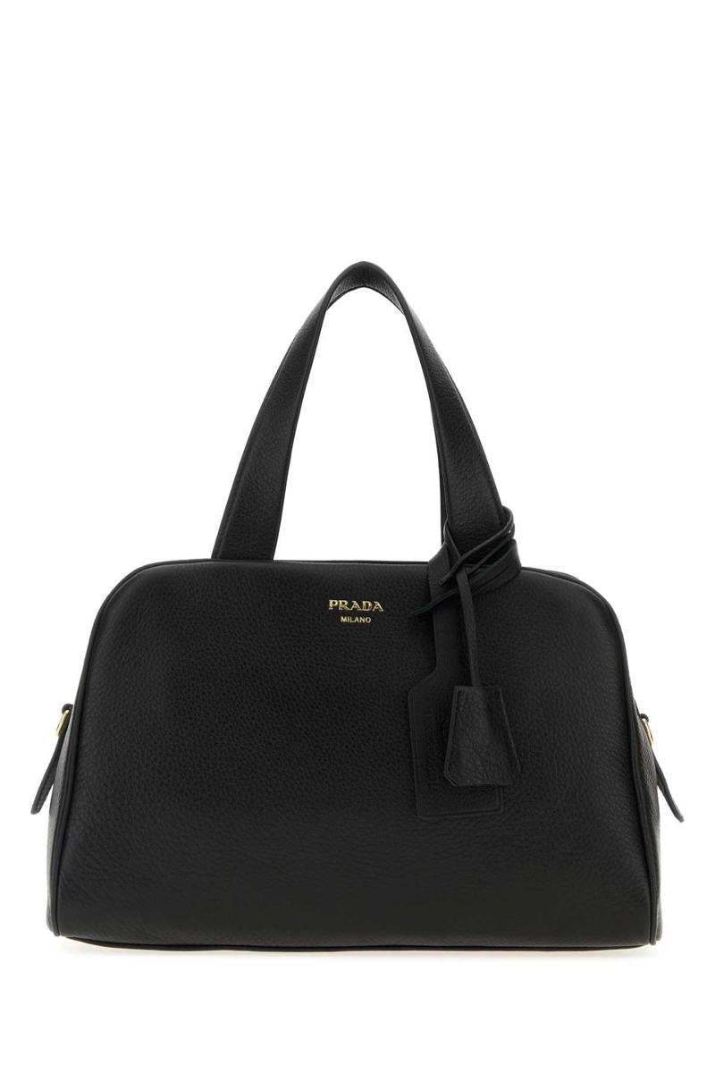 Prada handväskor.