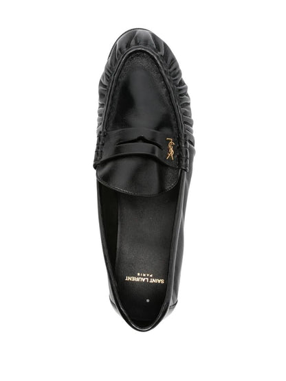 Saint Laurent Le Loafer Smidiga I Glänsande Läderskor