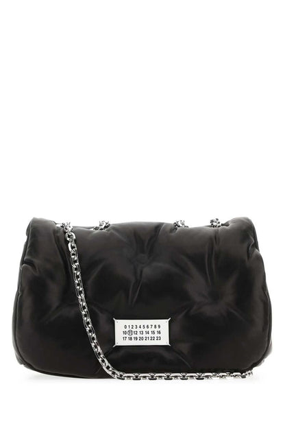 Maison Margiela handväskor.