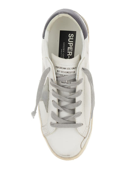 Vita låga sneakers med stjärnmärke i vintageläder för kvinnor