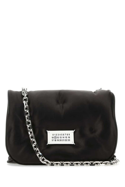 Maison Margiela handväskor.