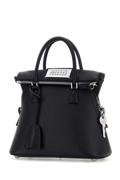 Maison Margiela handväskor.