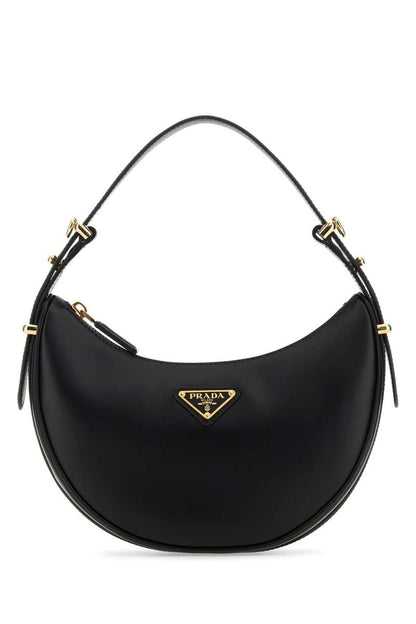 Prada handväskor.