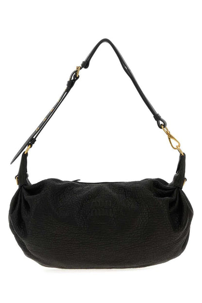 Miu Miu handväskor.
