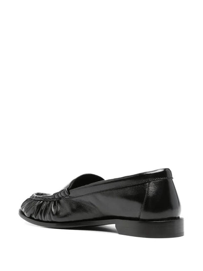 Saint Laurent Le Loafer Smidiga I Glänsande Läderskor