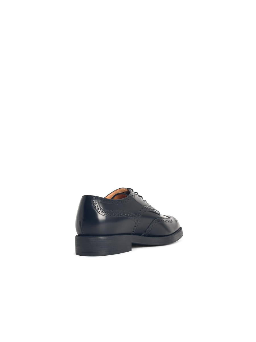 Tod's svarta läderskor med snörning
