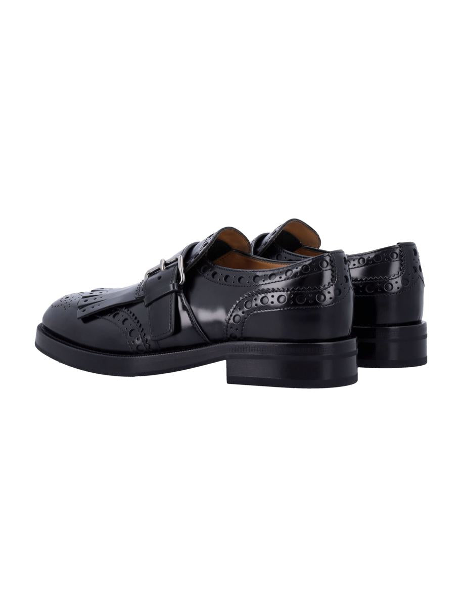 Church'S svarta läderbrogues med munkrem