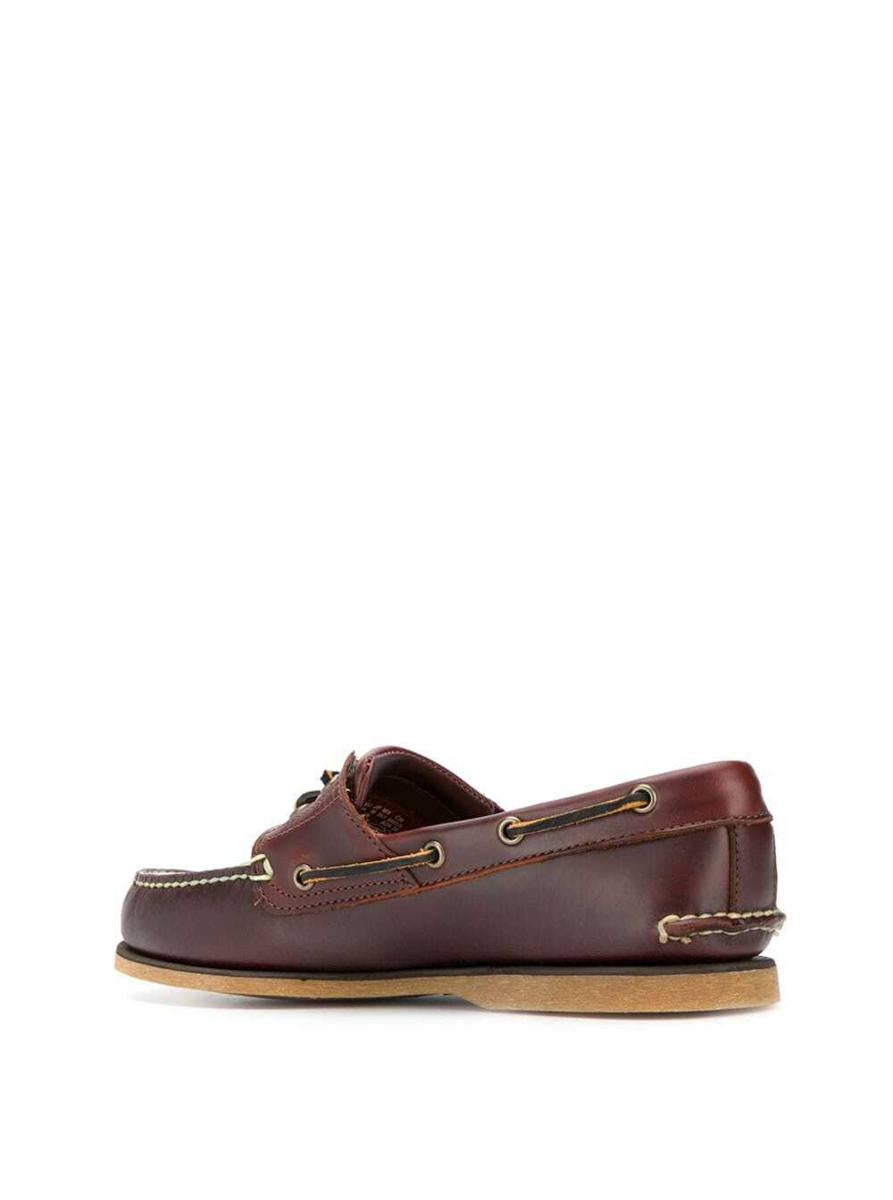 Klassiska båtloafers i brunt läder för män