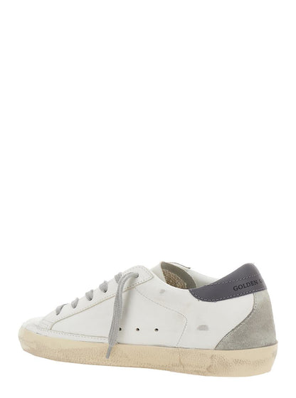 Vita låga sneakers med stjärnmärke i vintageläder för kvinnor