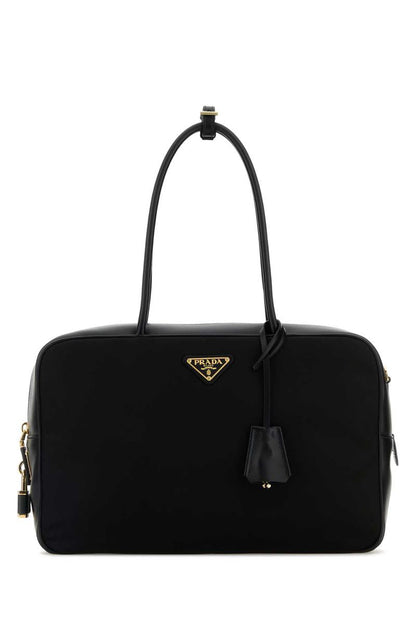 Prada handväskor.