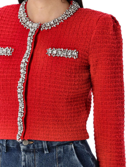 Stickad kofta med textur och självporträtt