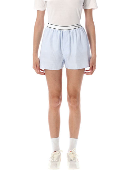 Sportiga och räckviddiga randiga Oxford-boxers med seriflogotyp