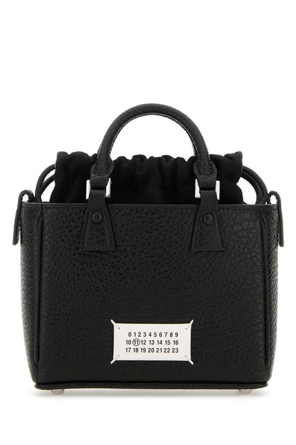Maison Margiela handväskor.
