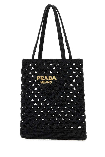 Prada handväskor.