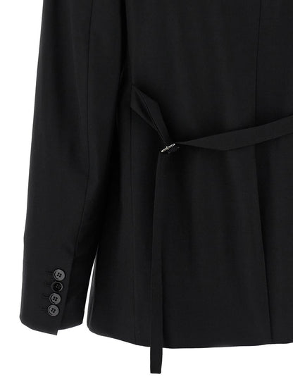 Nensi Dojaka kavaj med bälte