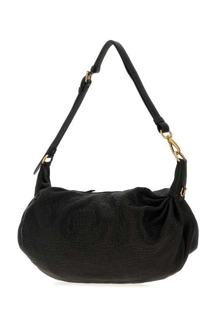 Miu Miu handväskor.
