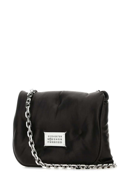 Maison Margiela handväskor.