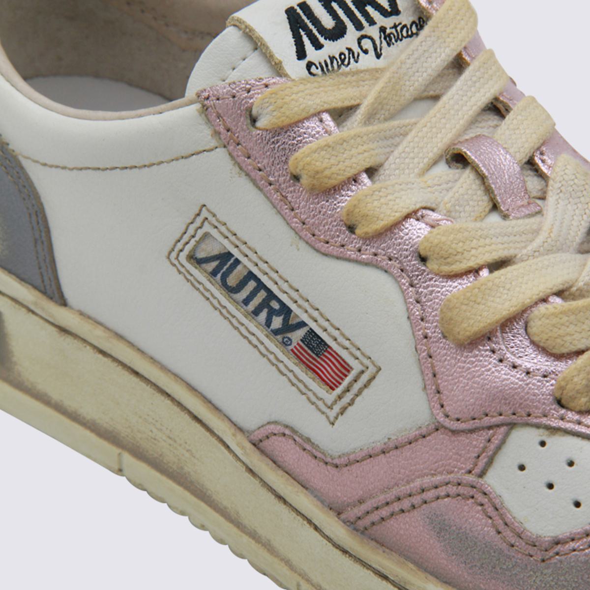 Autry Vita och Grå Sup Vint Låga Metallsneakers
