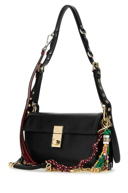 Prada handväskor.